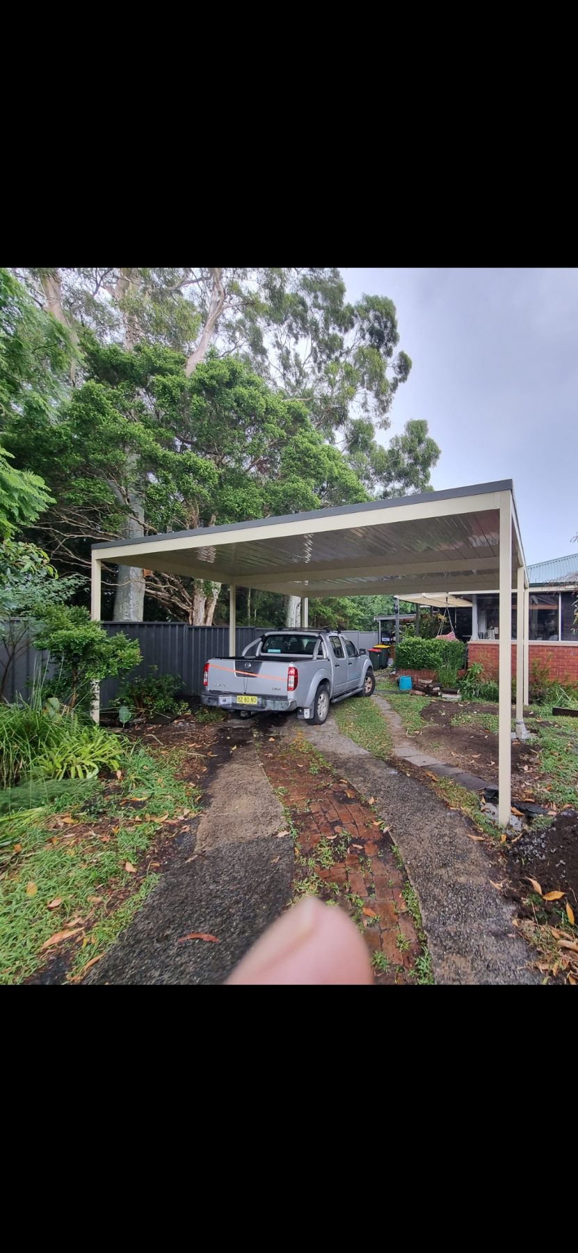 Freestanding flat roof carport